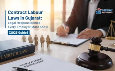 Labour contractor reviewing compliance documents at a Gujarat factory